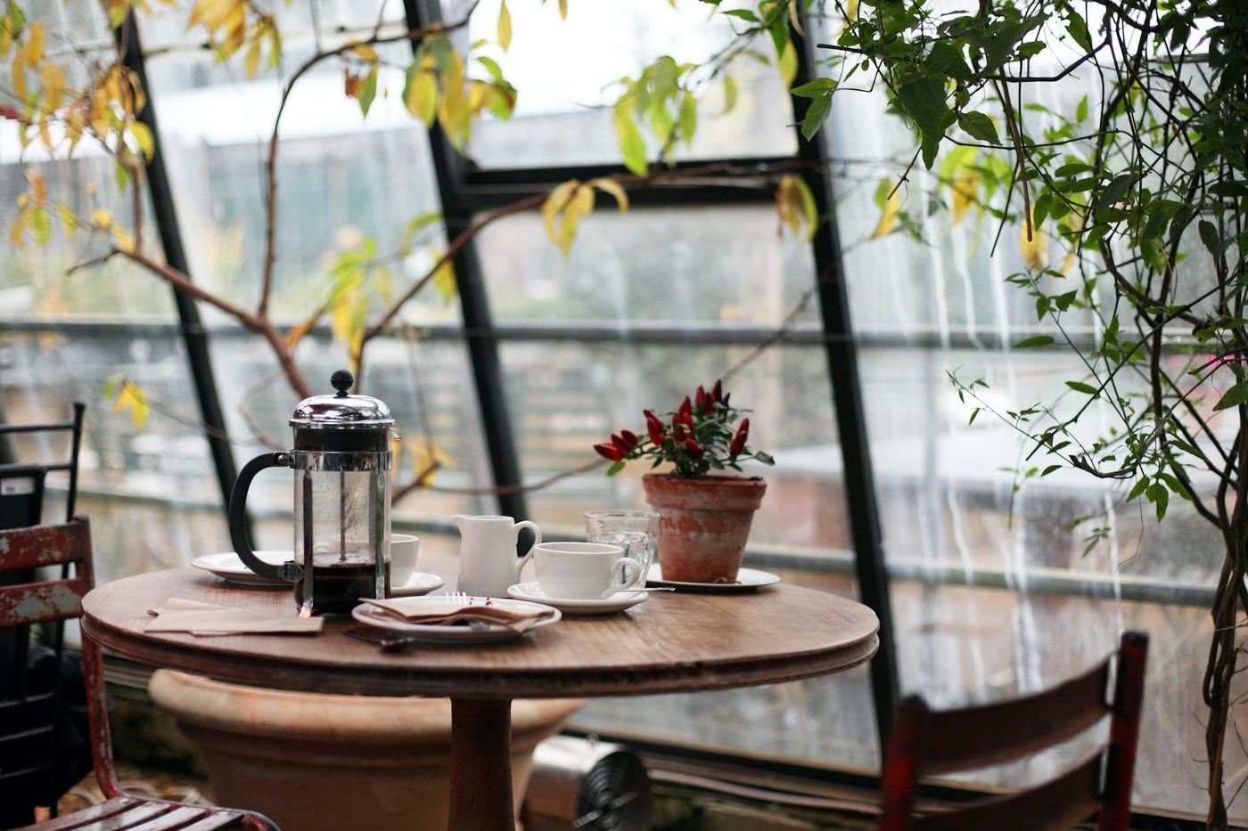 A quiet café table set for a conversation